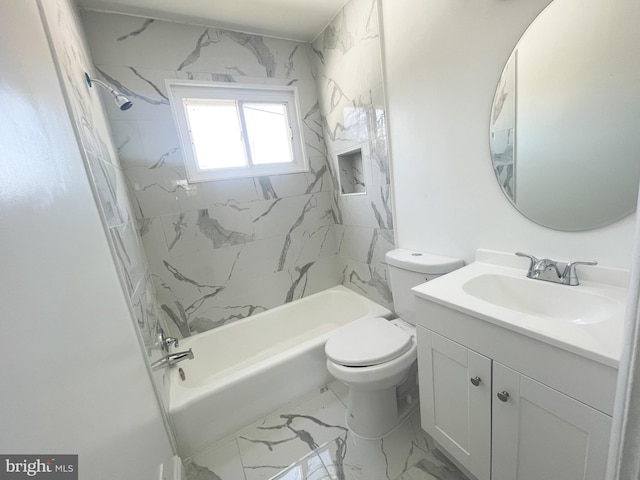 full bathroom featuring tiled shower / bath combo, vanity, and toilet