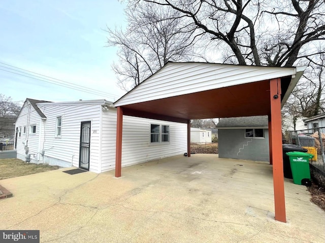 view of car parking featuring a carport