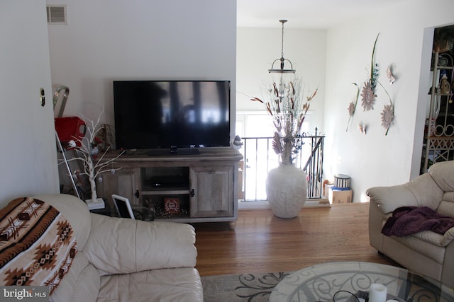 living room with wood-type flooring