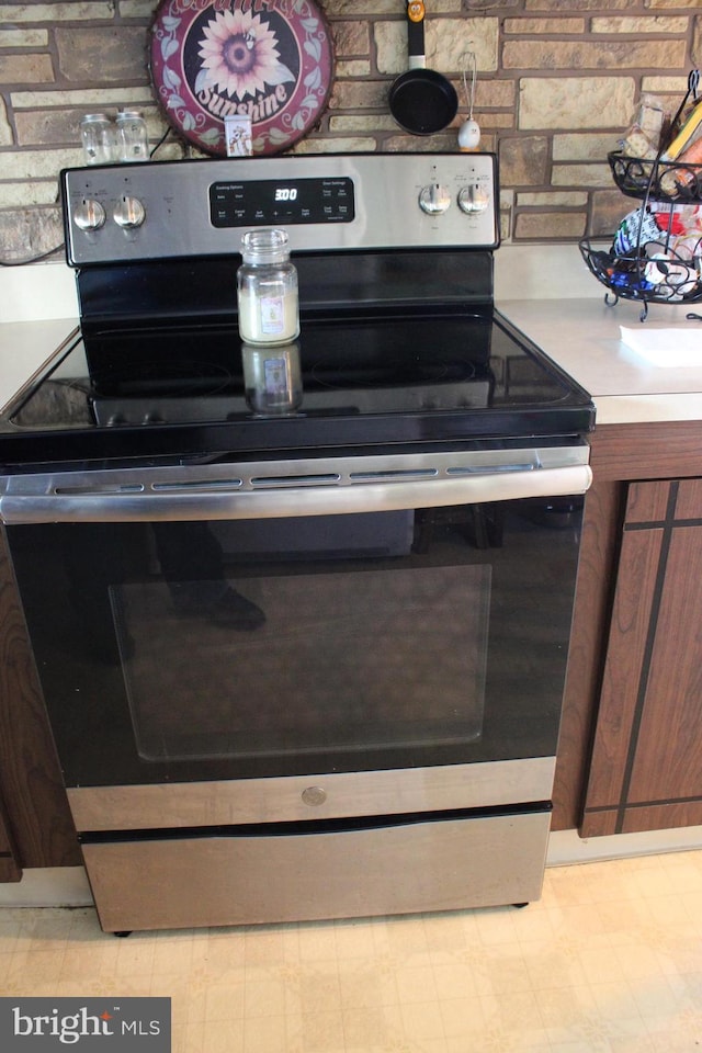 room details featuring stainless steel electric range oven