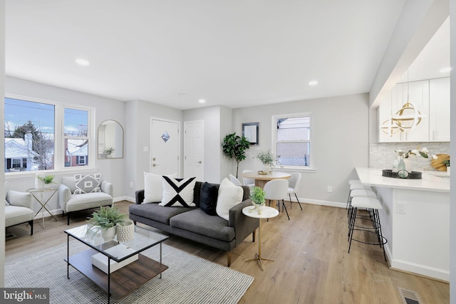 living room with light wood-type flooring