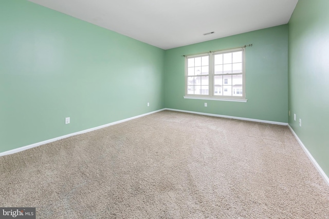 view of carpeted spare room