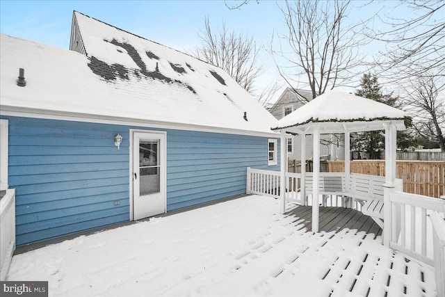 snow covered deck with a gazebo