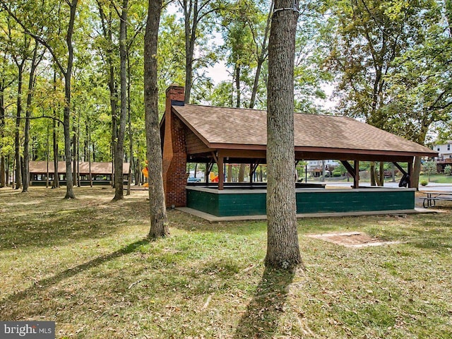 view of property's community featuring a gazebo and a lawn