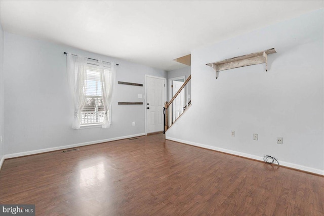 interior space with dark wood-type flooring