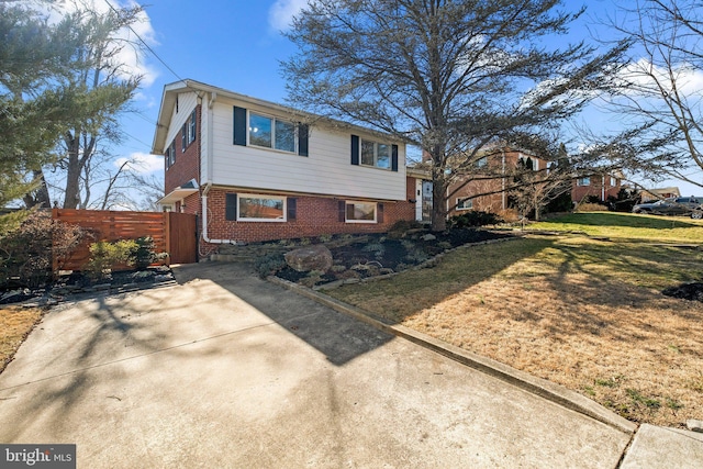 view of home's exterior featuring a lawn