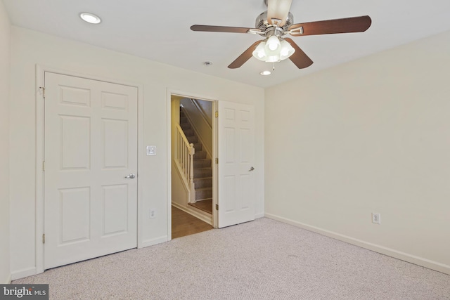 unfurnished bedroom with recessed lighting, baseboards, ceiling fan, and carpet flooring