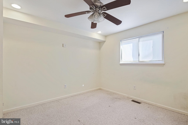 unfurnished room featuring visible vents, recessed lighting, baseboards, and carpet floors