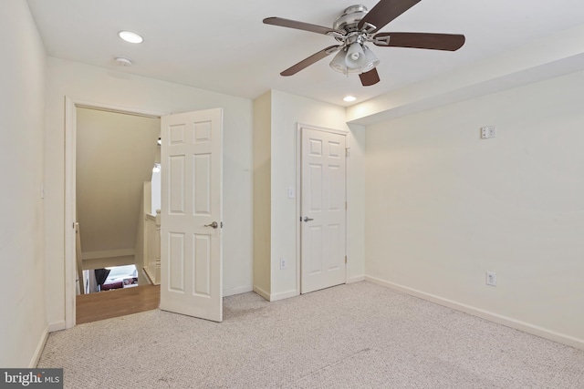 unfurnished bedroom with recessed lighting, baseboards, carpet floors, and ceiling fan