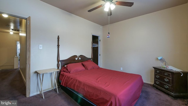 bedroom featuring dark colored carpet and ceiling fan