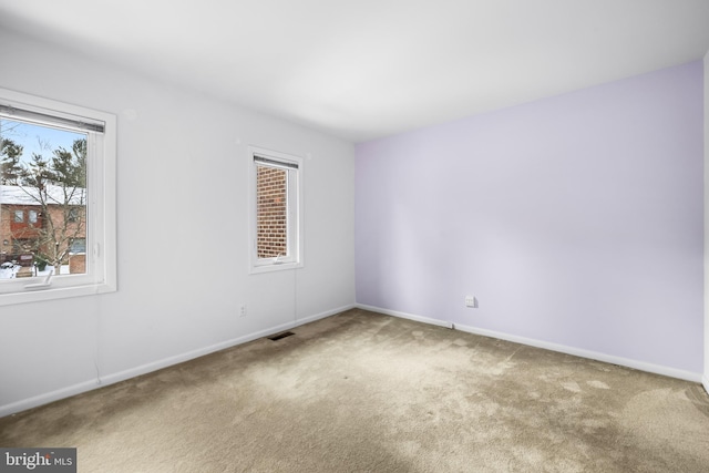 empty room with carpet floors