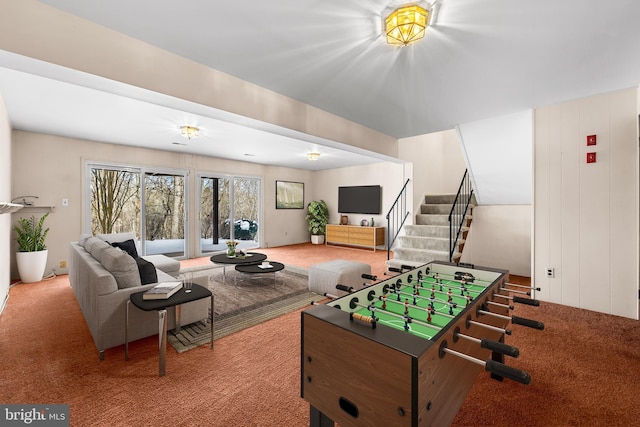 rec room featuring carpet flooring