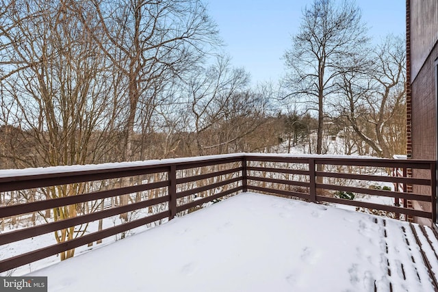 view of snow covered deck