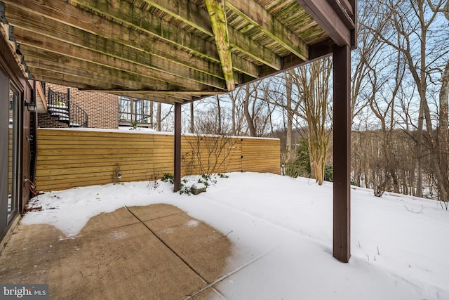 view of snow covered patio