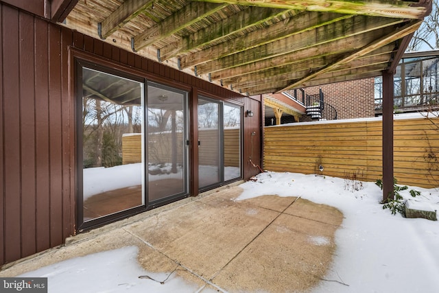 view of snow covered patio