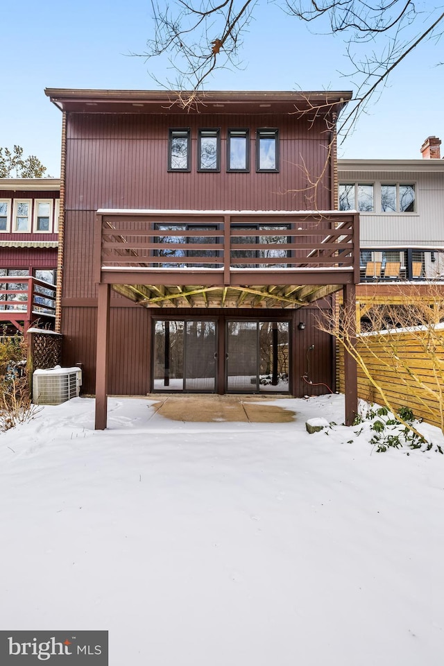 view of snow covered house