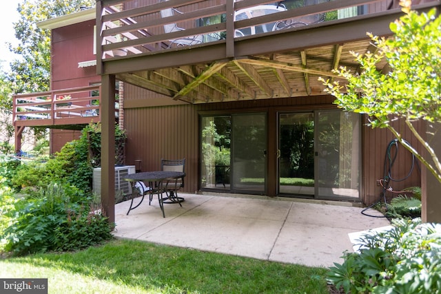 view of patio / terrace with a pergola and central air condition unit