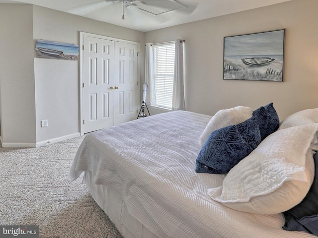 bedroom featuring carpet flooring, a closet, and ceiling fan