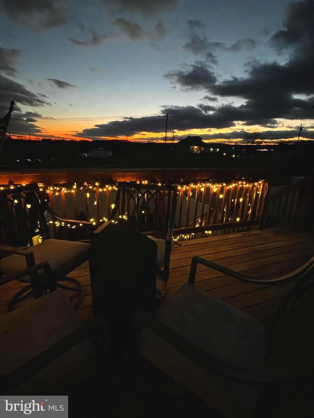 view of patio terrace at dusk