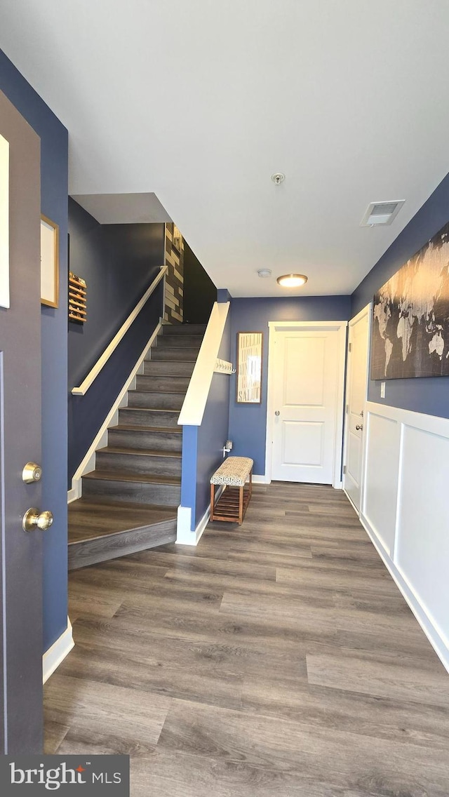 foyer featuring wood-type flooring