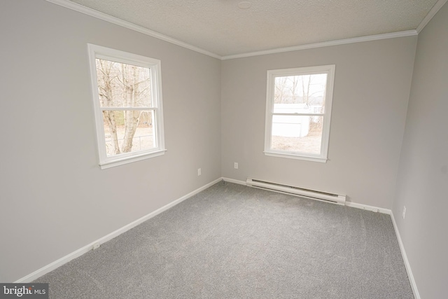 carpeted spare room featuring crown molding, a textured ceiling, and a baseboard heating unit