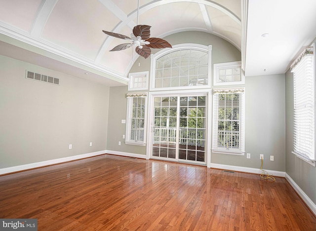 unfurnished living room with ceiling fan and wood-type flooring