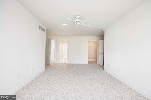 spare room with ceiling fan