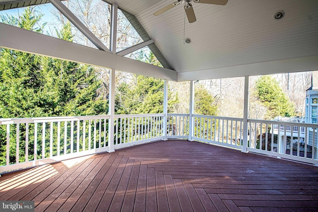 wooden terrace featuring ceiling fan