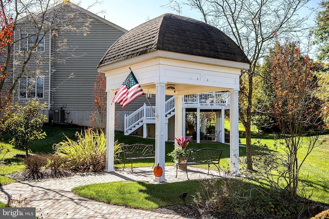 exterior space with a lawn and a gazebo