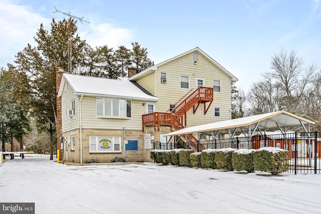 view of snow covered property