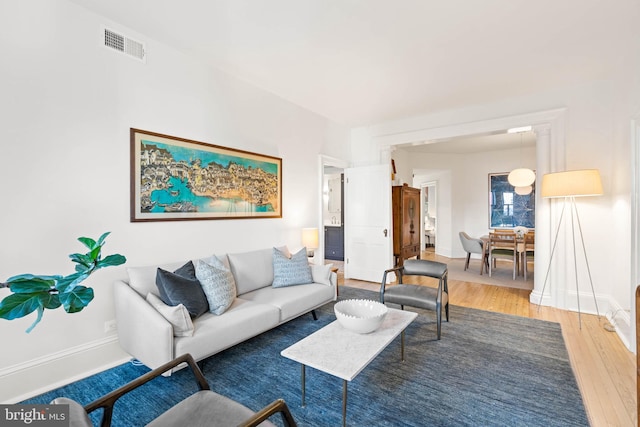 living room with hardwood / wood-style flooring