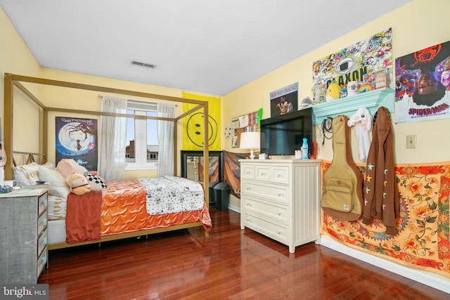 bedroom featuring hardwood / wood-style flooring