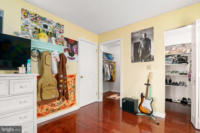 bedroom featuring hardwood / wood-style floors