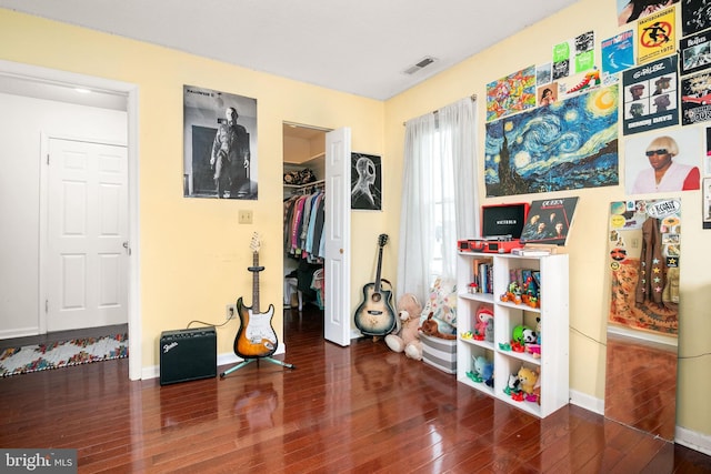 misc room with dark hardwood / wood-style flooring