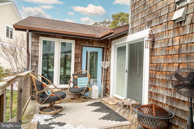 wooden deck with ceiling fan