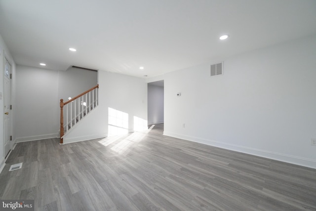 spare room featuring hardwood / wood-style floors