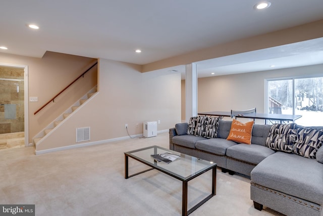 living room with light colored carpet