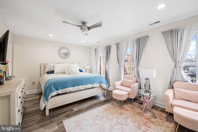 bedroom with ceiling fan and hardwood / wood-style floors