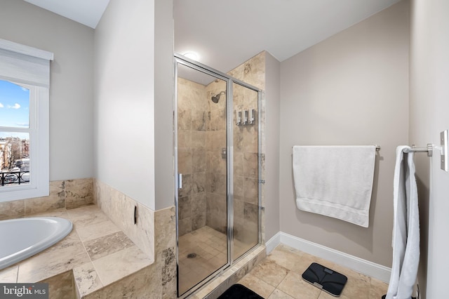 bathroom featuring walk in shower and tile patterned floors