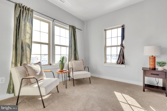 sitting room with light carpet