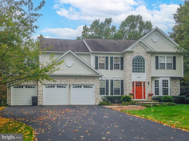 view of front of home with a garage