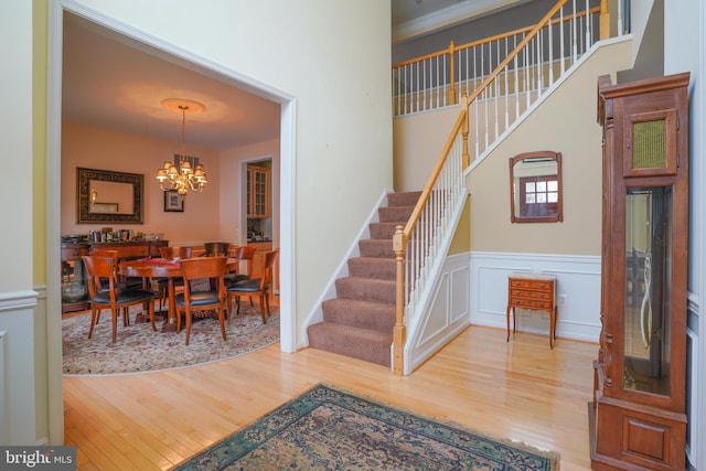 interior space with hardwood / wood-style floors and a chandelier