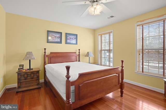 bedroom featuring ceiling fan and hardwood / wood-style floors