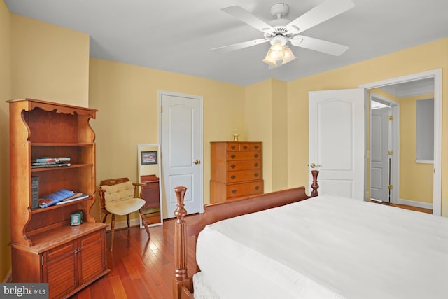 bedroom featuring ceiling fan and hardwood / wood-style floors