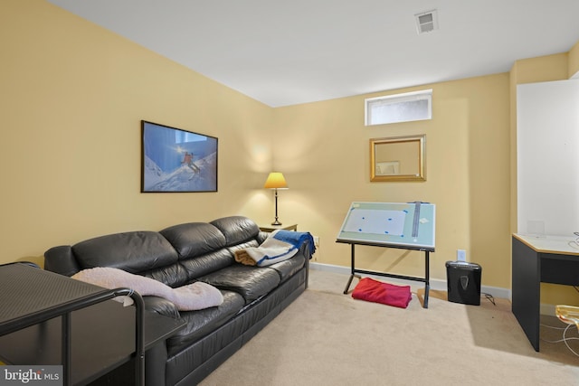 living room with light colored carpet