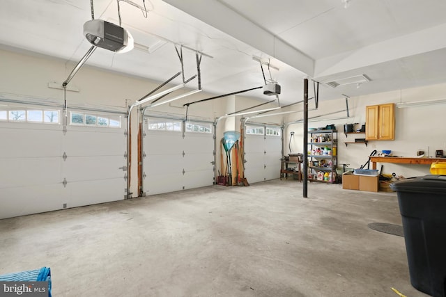 garage featuring a garage door opener