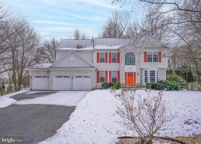 view of front of home with a garage