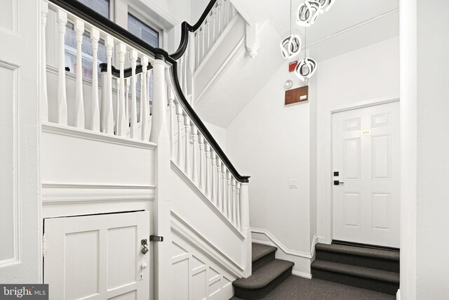 stairway with baseboards