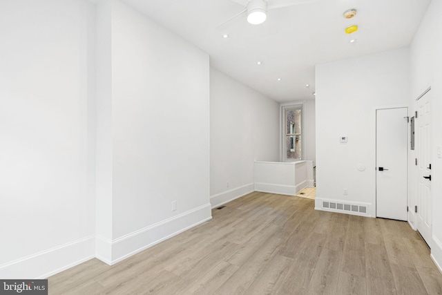 unfurnished room featuring light hardwood / wood-style flooring