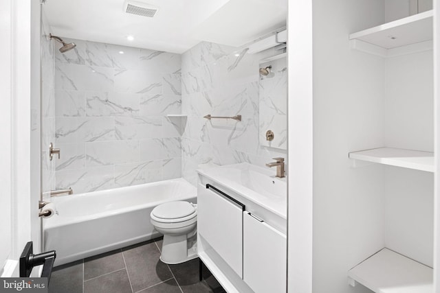 full bathroom with visible vents, toilet, tile patterned flooring, tub / shower combination, and vanity